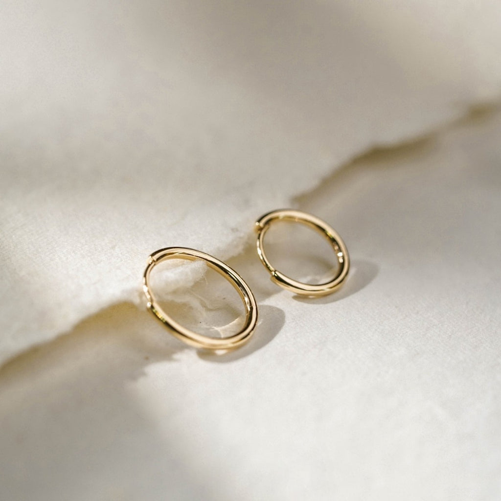 Minimalist stud earrings and hoop earrings available