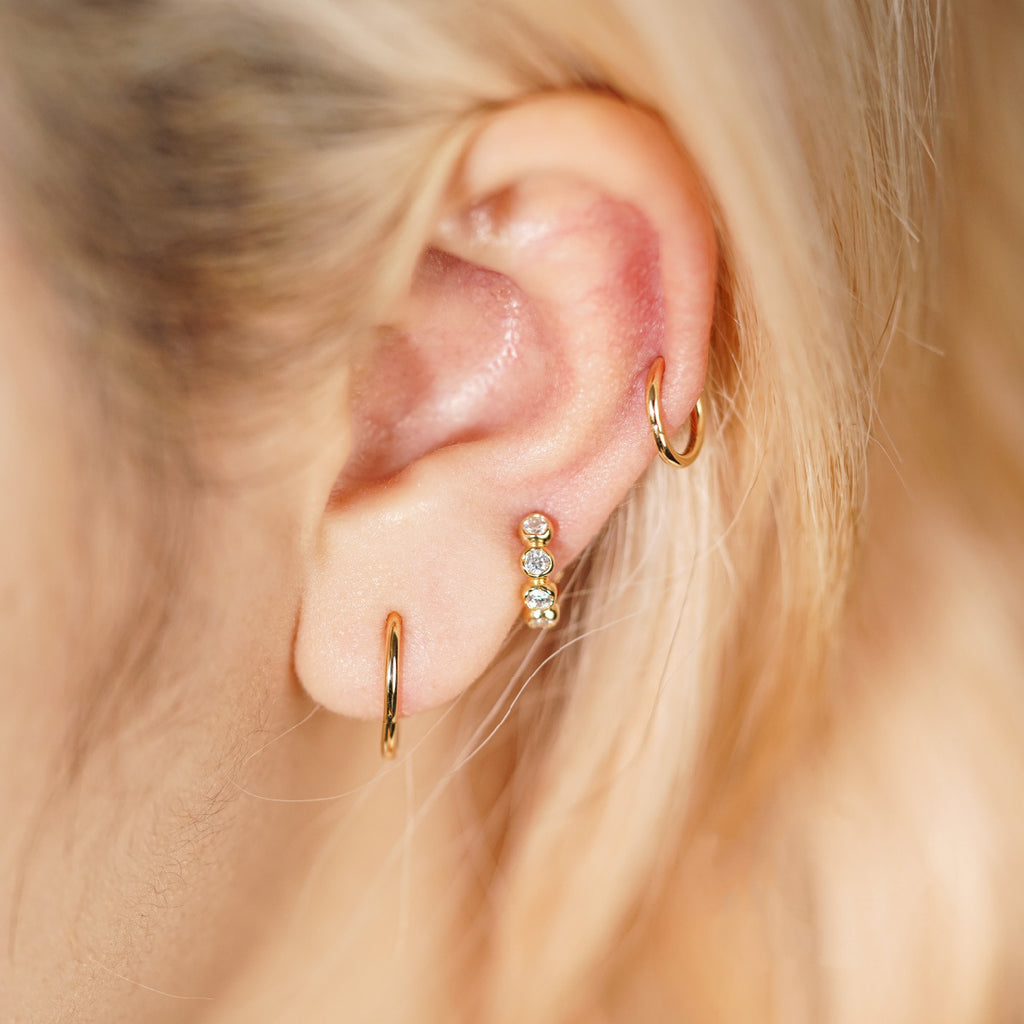 Minimalist stud earrings and hoop earrings available