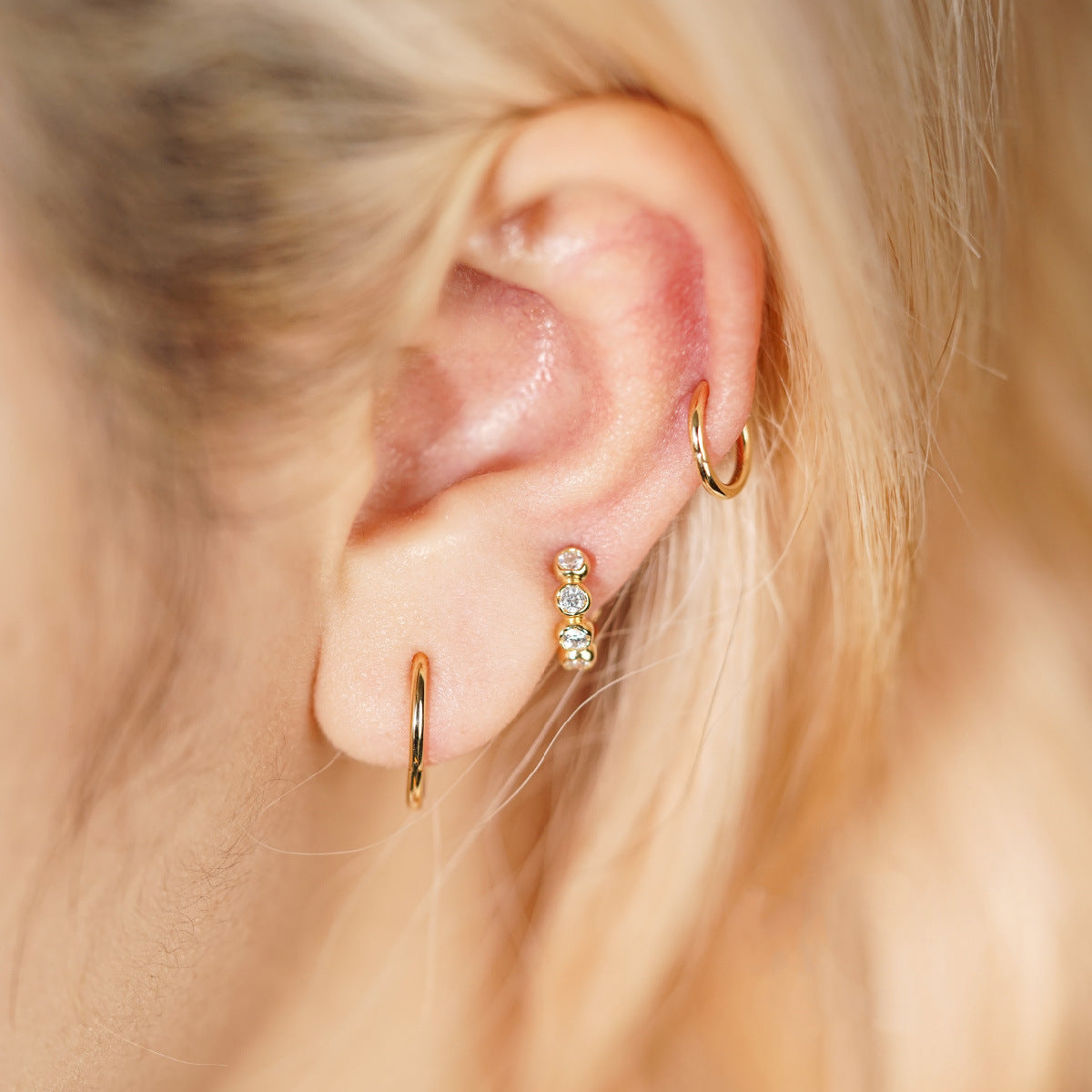 Minimalist stud earrings and hoop earrings available
