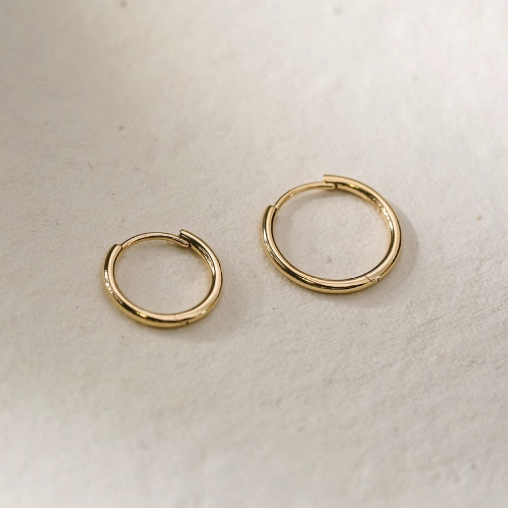 Minimalist stud earrings and hoop earrings available