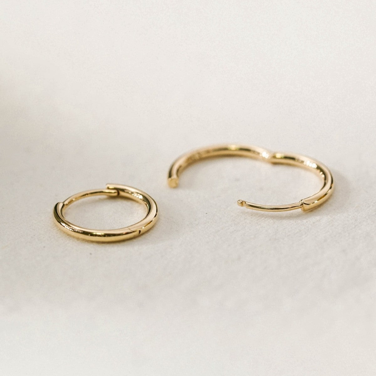 Minimalist stud earrings and hoop earrings available
